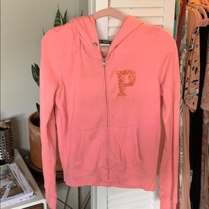 Pink full zip sparkly jacket.